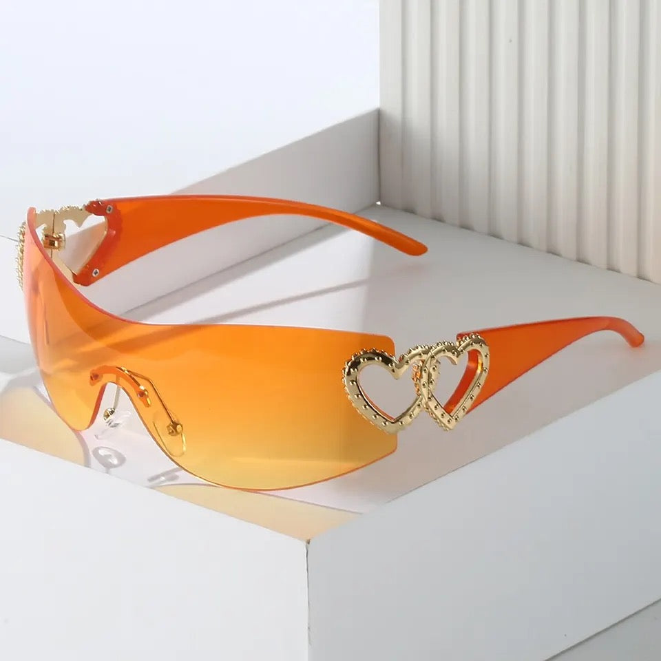 “Heartless” Orange Rimless Shield Sunglasses